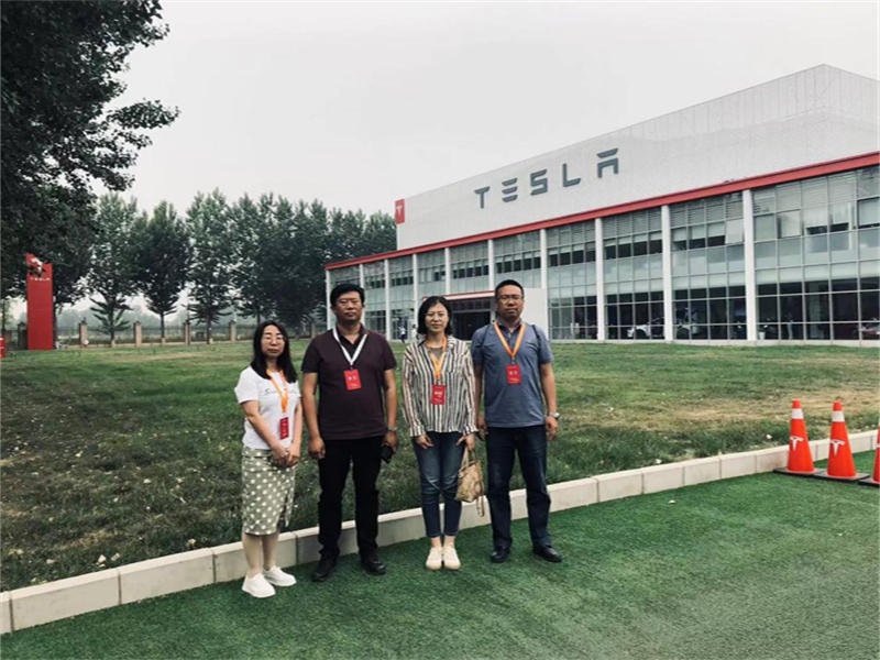 数智助力产业 科技赋能未来——2026年世界杯教师赴特斯拉北京交付中心和用友网络科技股份有限公司北京总部纪实